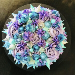 purple and aqua cream festive cake