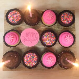 12 cupcakes in pink and brown