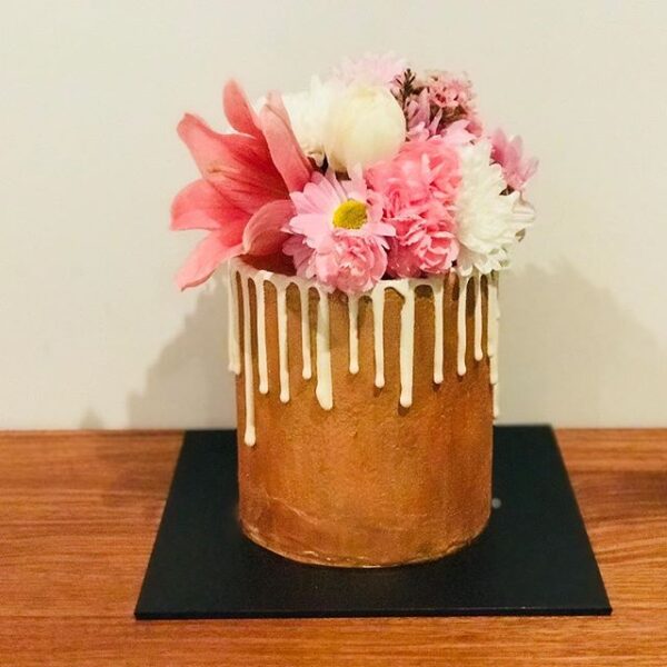 drip cake with pink florals