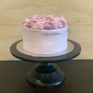 vegan vanilla cake in pink and purple