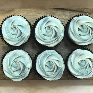 vanilla cupcakes blue top view