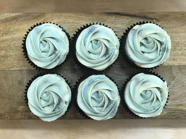 vanilla cupcakes blue top view